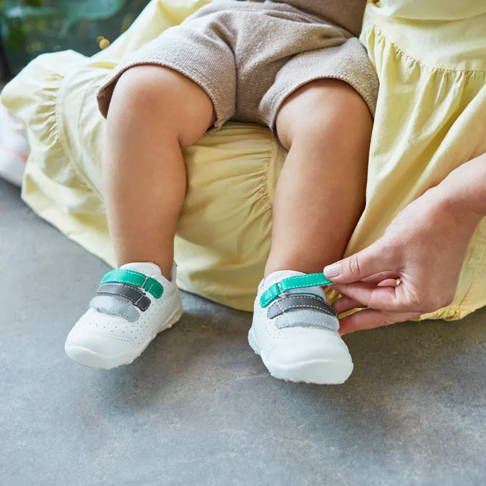 Toddler trying on Bibi kids' trainers